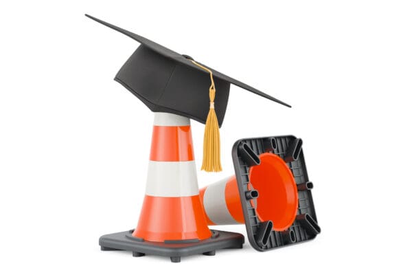 Graduation cap on traffic cones.